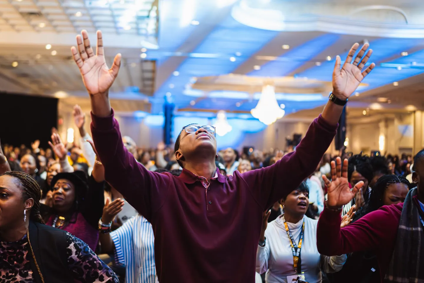 A believer worshipping during a KSOM Immersion gathering