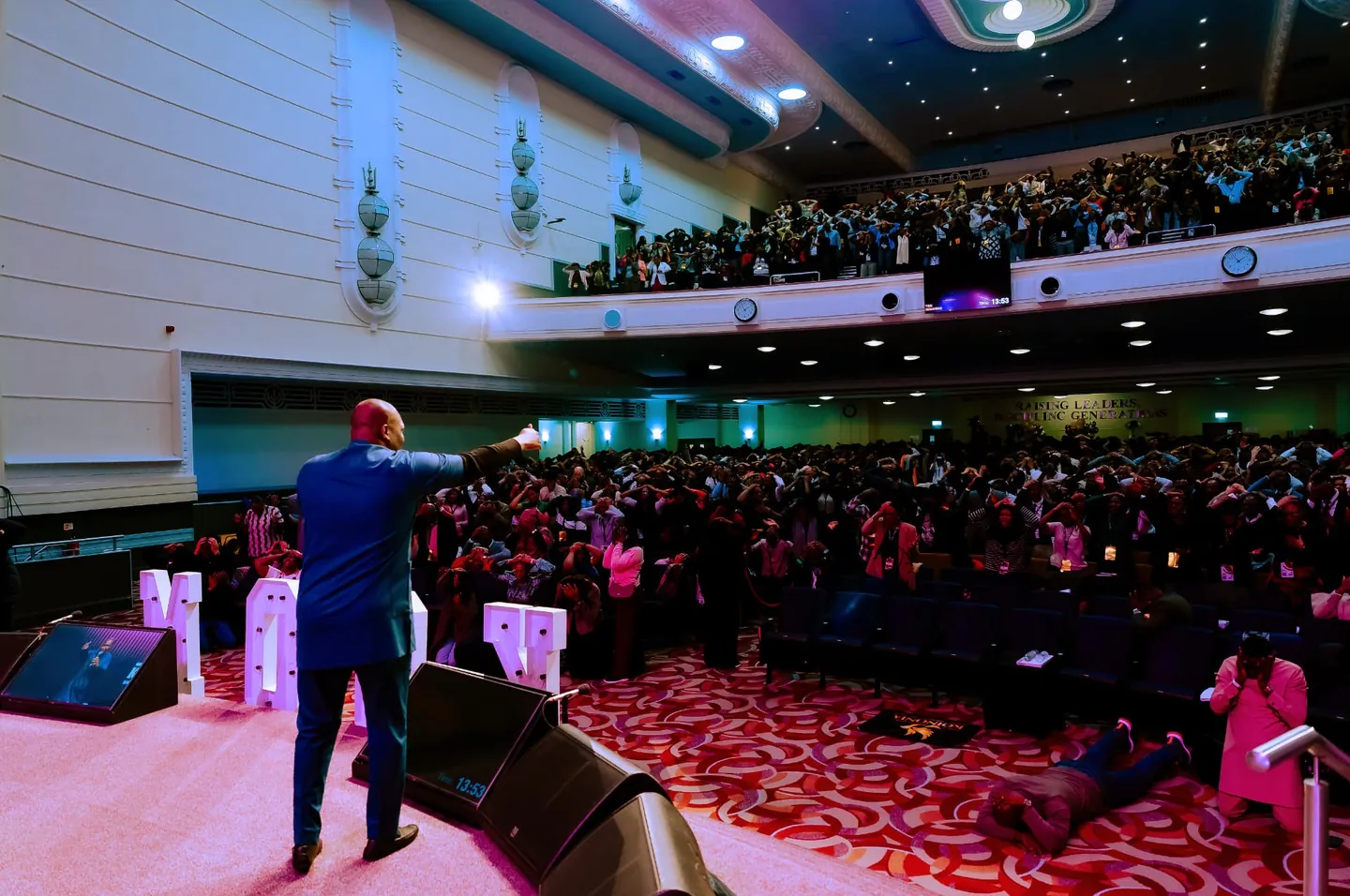 Apostle Joshua Selman teaching a full KSOM auditorium